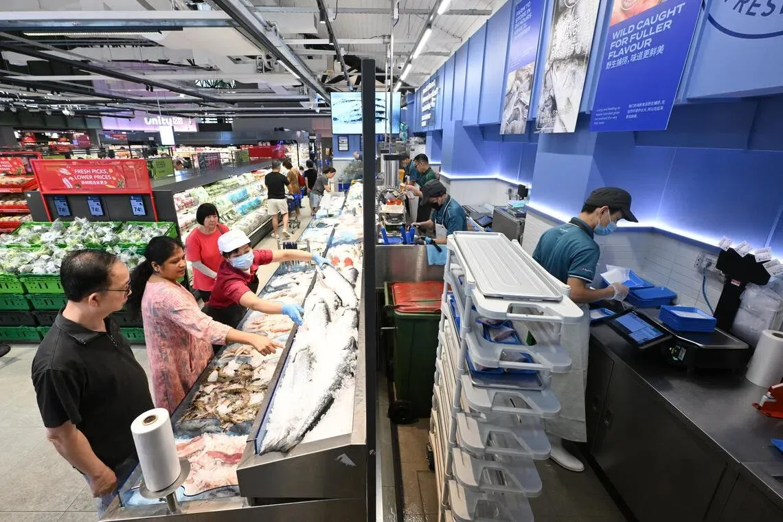 Pasir Ris'te yeni 24 saat açık FairPrice süpermarkette geleneksel ıslak pazar deneyimi