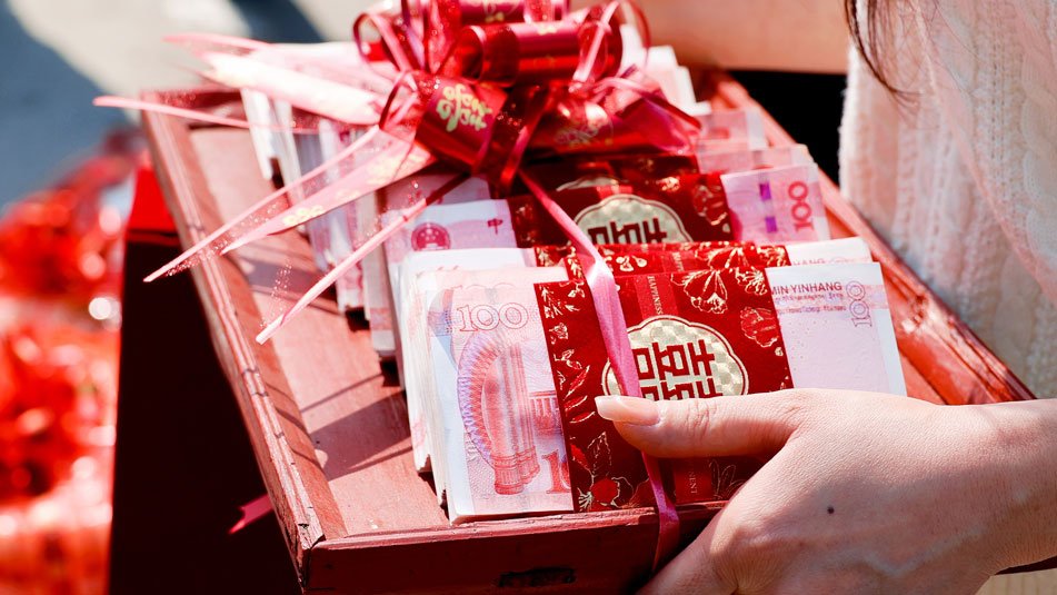 Çin'de bir ilçe yükselen gelin fiyatlarına karşı harekete geçti